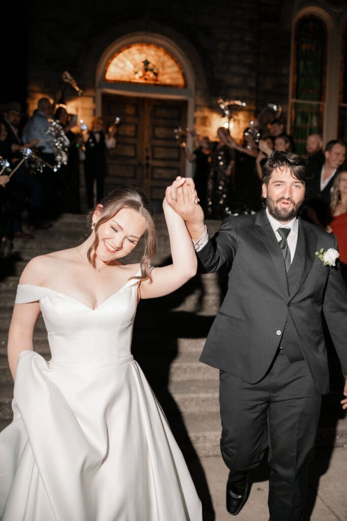 Bride and groom's grand exit with tinsel streamers
