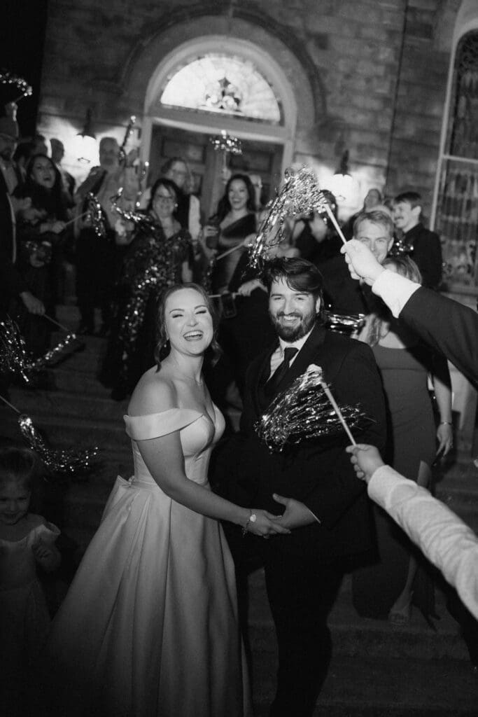 Bride and groom's grand exit with tinsel streamers