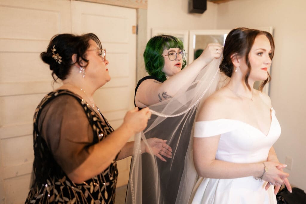 Bride getting ready at The 1906 wedding venue in Whitesboro, TX
