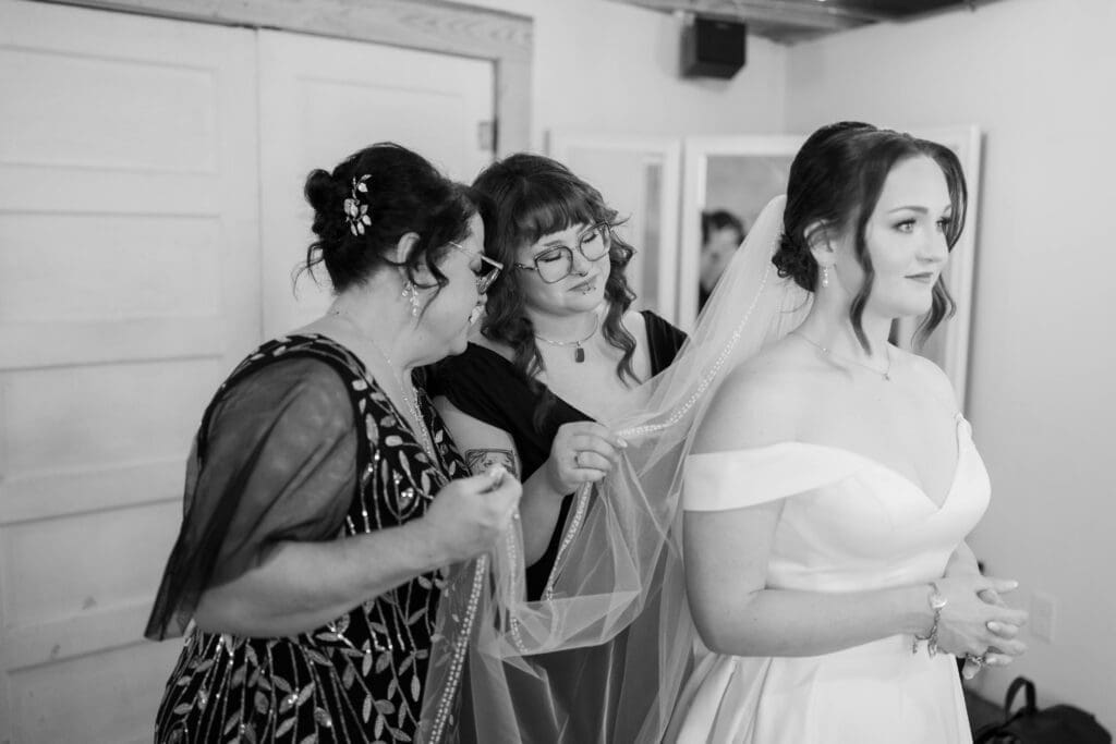 Bride getting ready at The 1906 wedding venue in Whitesboro, TX