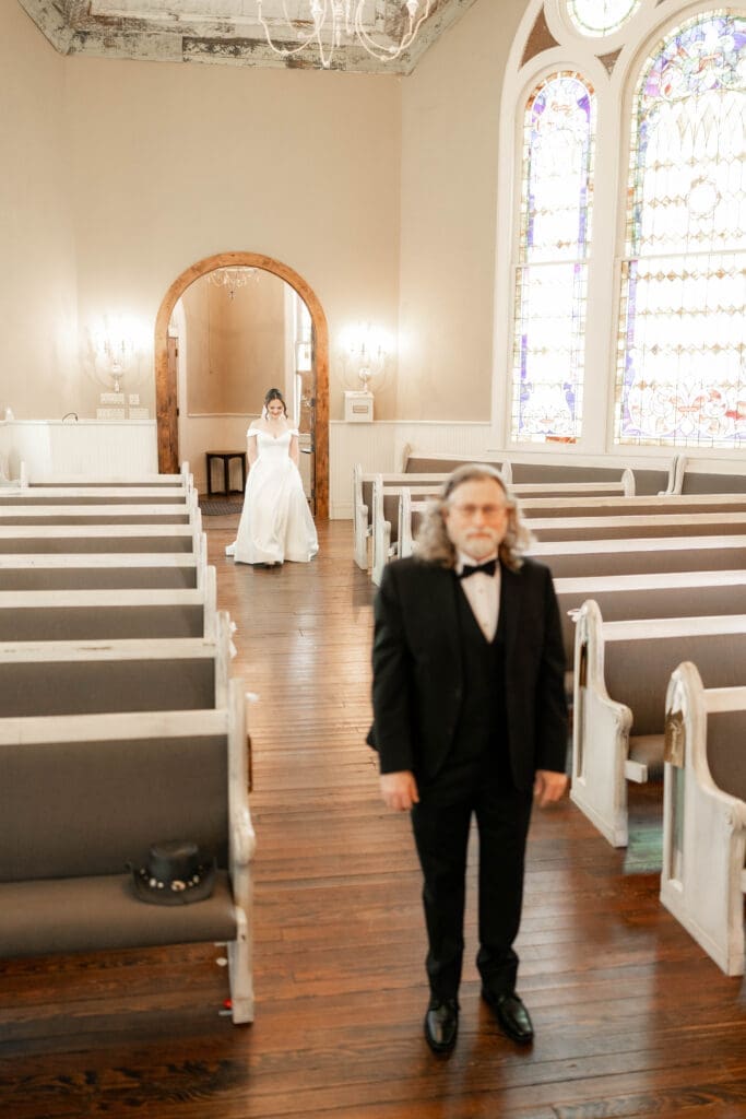 Bride's first look with her father at The 1906 wedding venue in Whitesboro, TX