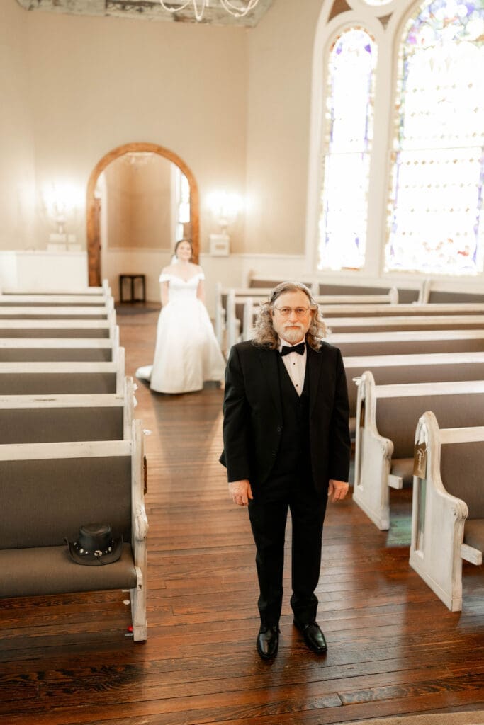 Bride's first look with her father at The 1906 wedding venue in Whitesboro, TX