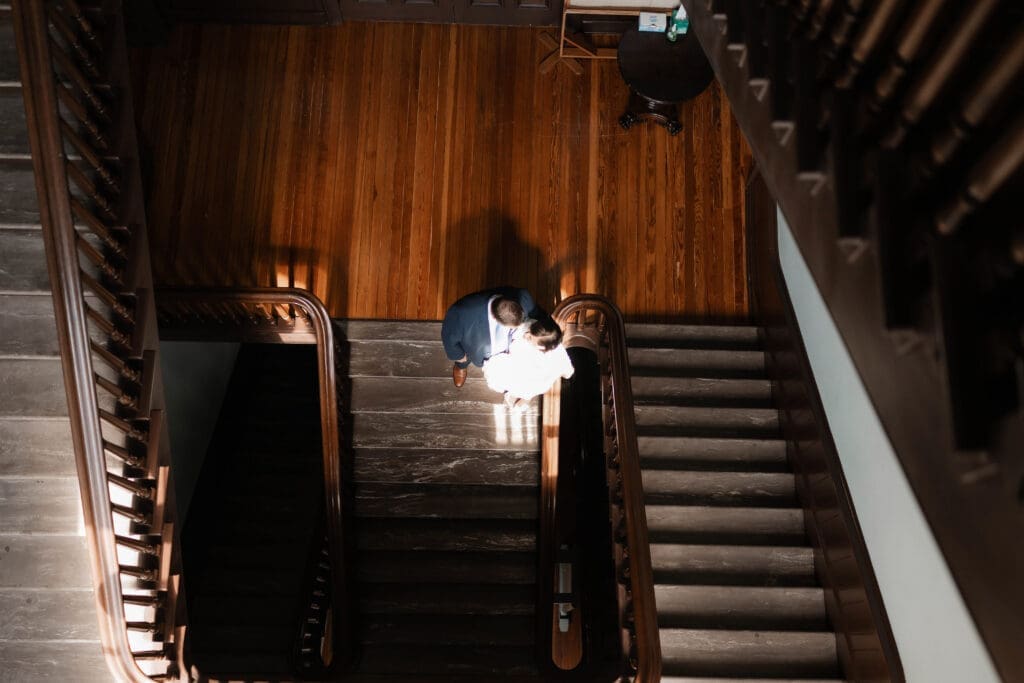 Bride and groom posing for portraits during their Downtown Weatherford Elopement 