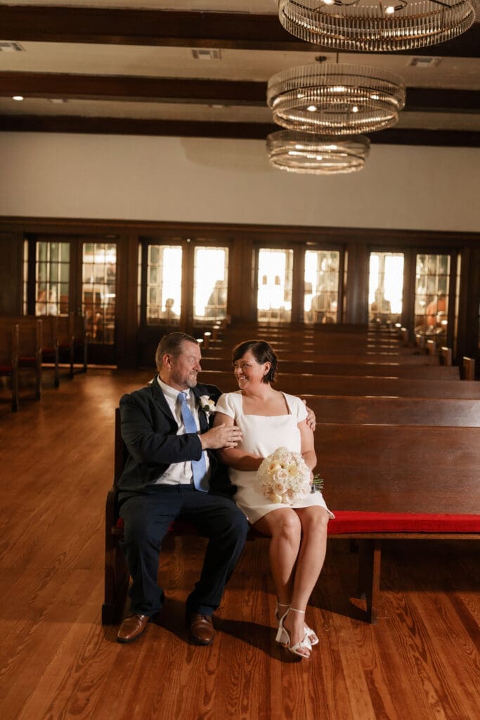 Bride and groom posing for portraits at another location after their Downtown Weatherford Elopement 