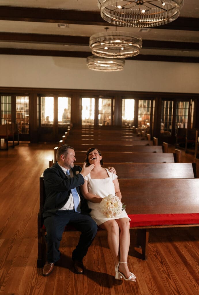 Bride and groom posing for portraits at another location after their Downtown Weatherford Elopement 