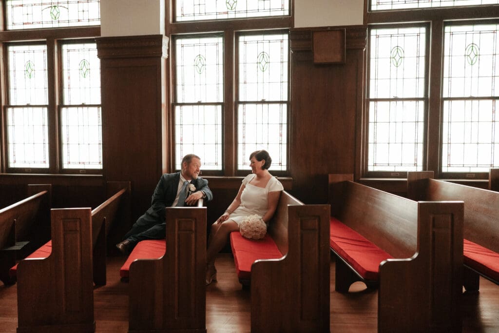 Bride and groom posing for portraits at another location after their Downtown Weatherford Elopement 