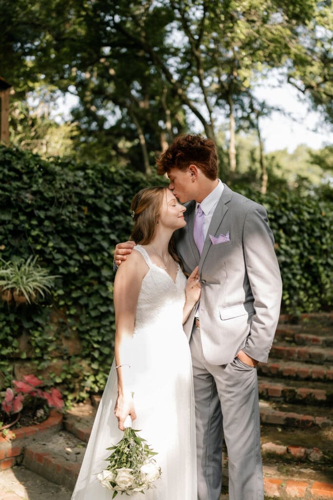 Bride and groom Chandor Gardens in Weatherford, TX, during their wedding photography session