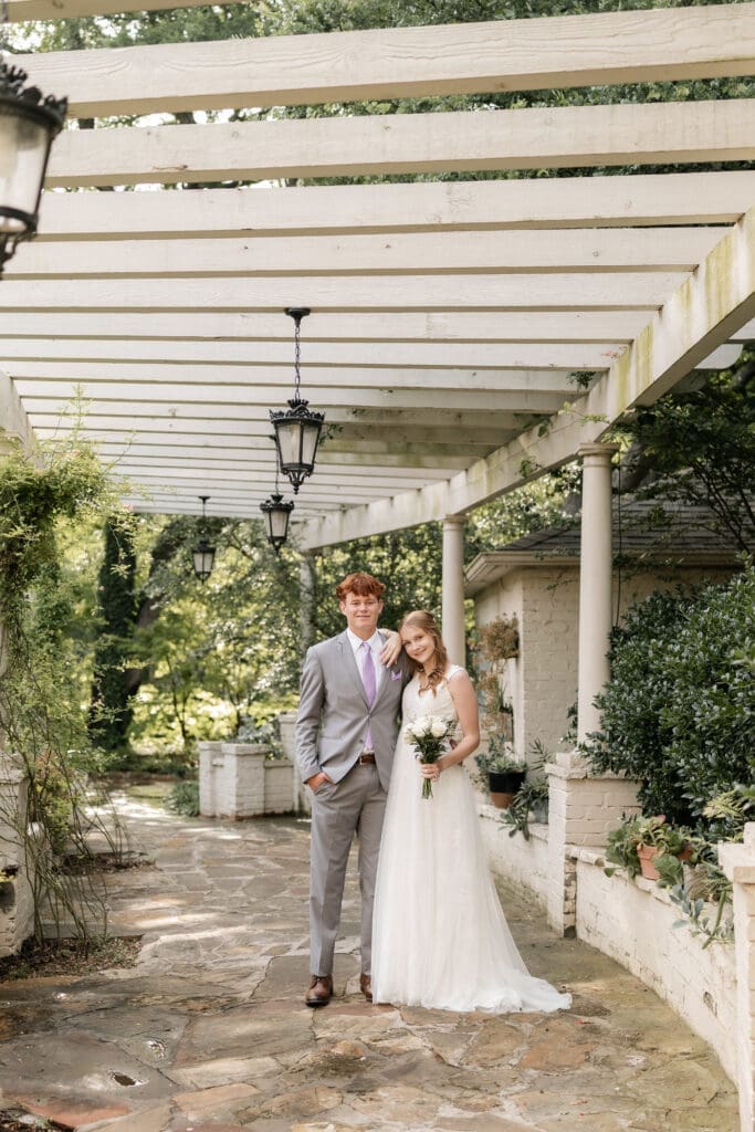 Bride and groom at Chandor Gardens in Weatherford, TX, during their wedding photography session