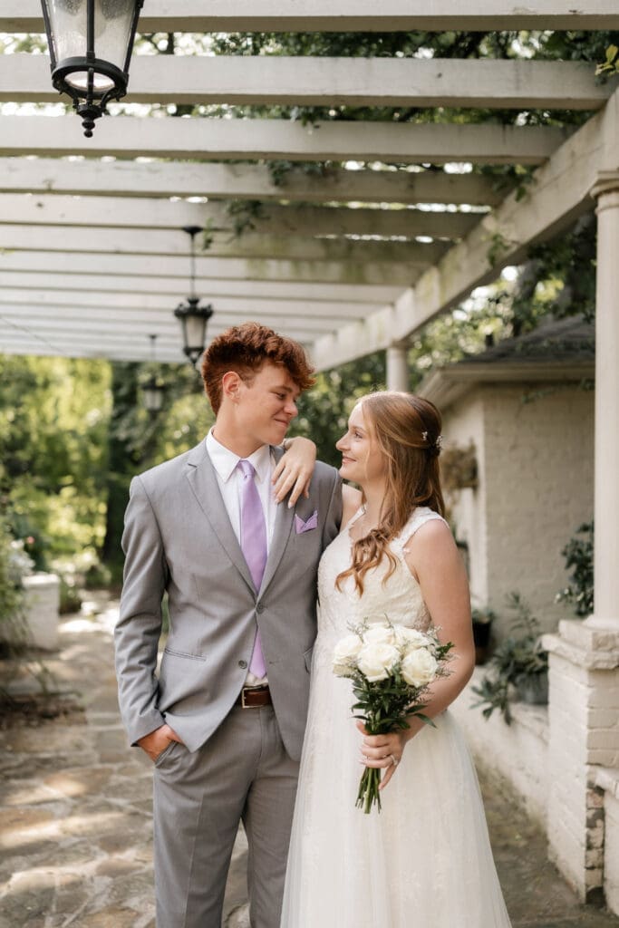 Bride and groom at Chandor Gardens in Weatherford, TX, during their wedding photography session
