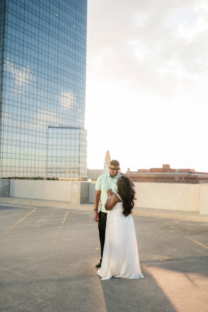 Golden hour rooftop engagement portraits with the Fort Worth skyline