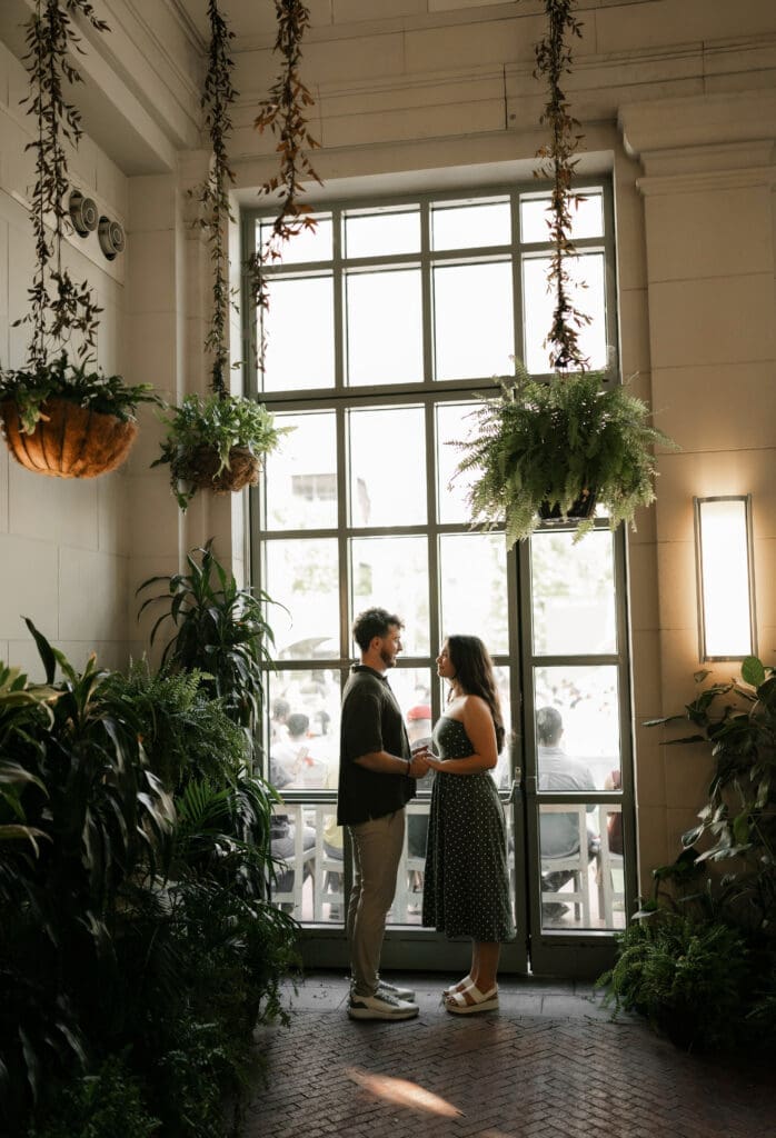 Man and woman embracing in the Sundance Pavilion in Sundance Square, Fort Worth