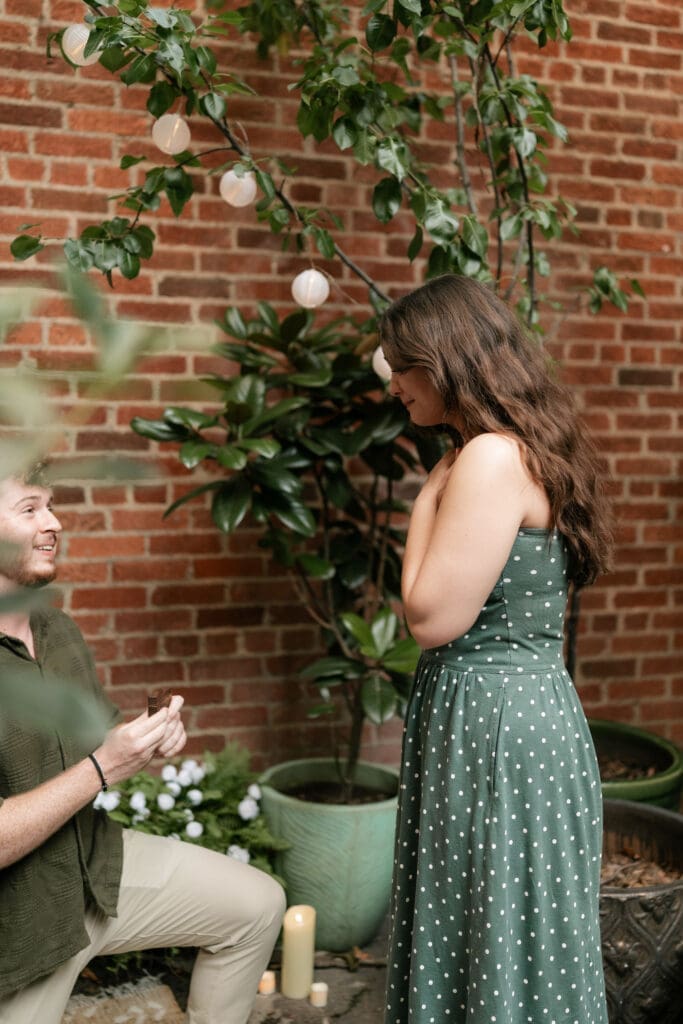 Man proposing to his girlfriend in Sundance Alley in Sundance Square, Fort Worht, TX