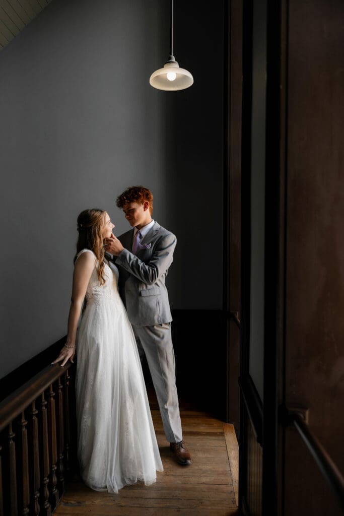 Moody shot of Bride and groom at the Weatherford Courthouse during their elopement