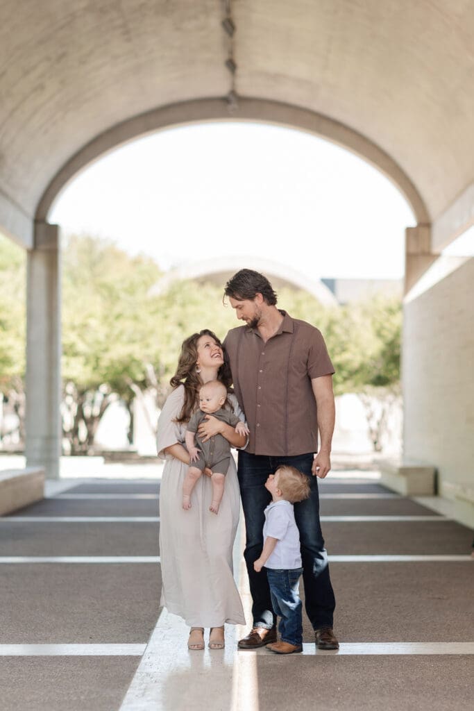 Family posing at Kimbell Art Museum during their family portrait session in Fort Worth