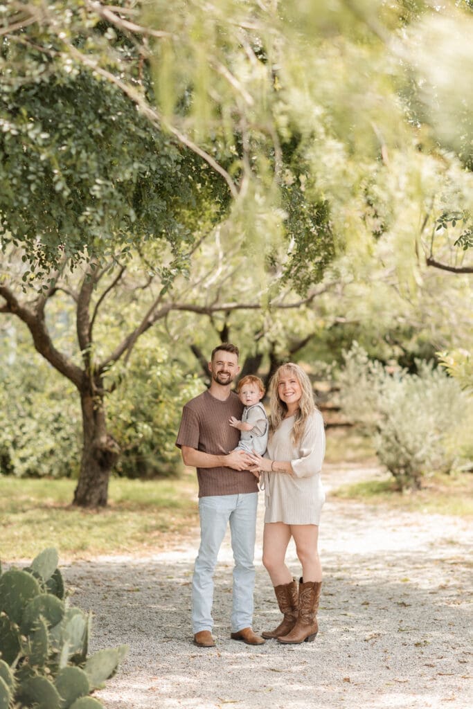 Husband and wife standing at the Cactus Garden in Fort Worth during their family photography session