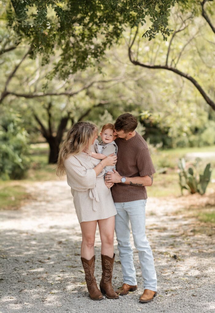 Husband and wife standing at the Cactus Garden in Fort Worth during their family photography session