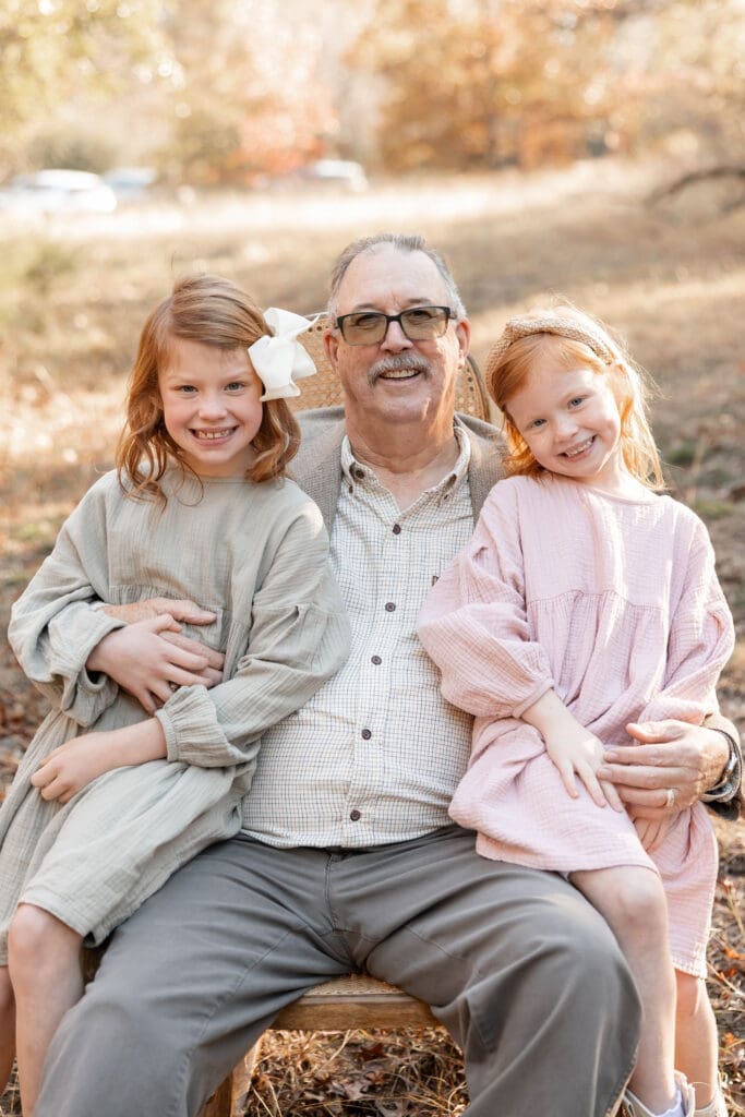 Golden hour Family posing for family portraits at Soldier Spring Park in Weatherford