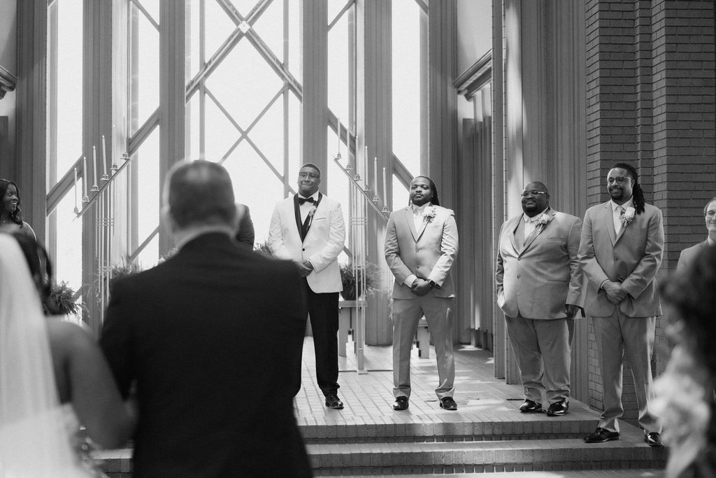 Groom tears up seeing his bride walk down the aisle