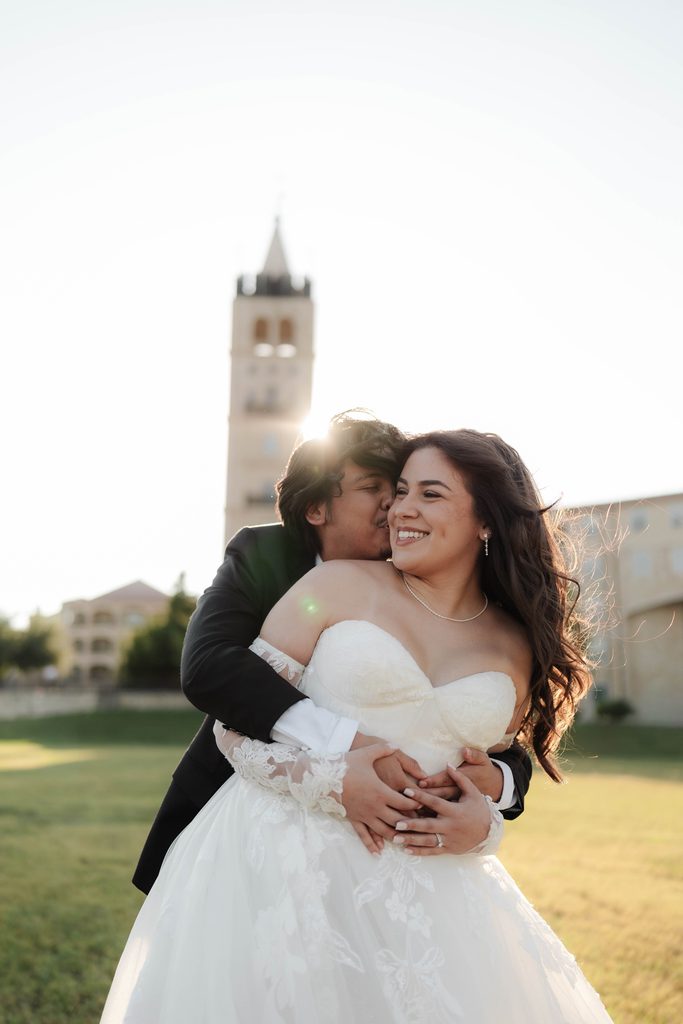 Bride and groom playfully running around at Adriatica Village during their portrait session